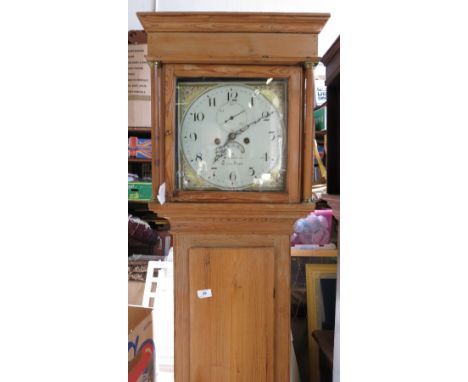 An Antique pine cased long case clock, the square painted dial inscribed W Walkman, with two winding holes, seconds dial and 