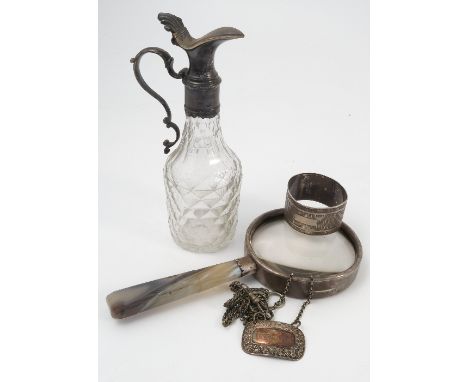 A silver magnifying glass, with agate handle, af, Birmingham 1912, together with a hallmarked silver napkin ring, a hallmarke