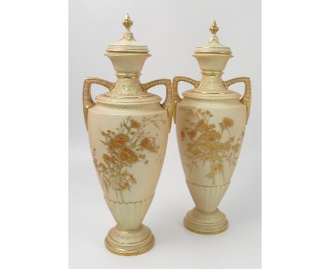 A pair of Royal Worcester gilded ivory vases, richly gilded with thistles, bearing monogram of Edward Rayby, shape number 176