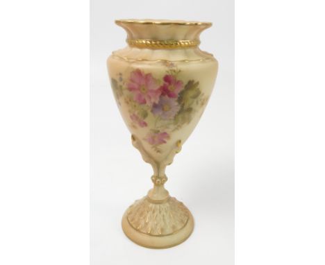 A Royal Worcester blush ivory vase, supported on a four claw base, decorated with flowers, shape number 2314, dated circa 191