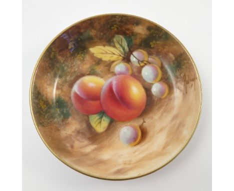 A Royal Worcester pin dish, hand painted with fruit to a mossy background by Roberts, diameter 4.5ins