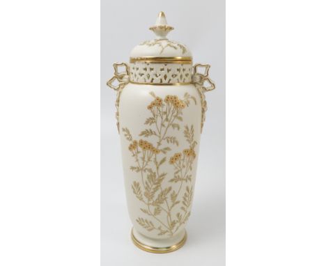 A Royal Worcester gilded ivory covered vase, with pierced neck, decorated with gilded foliage, coral and turquoise gilding an