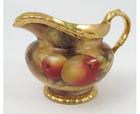 A Royal Worcester jug, hand painted with fruit to a mossy background by J Smith, with gilt interior, height 4ins