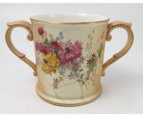 A Royal Worcester blush ivory two handled mug, decorated with flowers, dated circa 1905, af, height 5ins