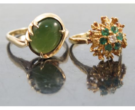 An emerald and diamond 18ct gold cluster ring, London 1967, finger size K, weight 5g gross, together with a nephrite ring sta
