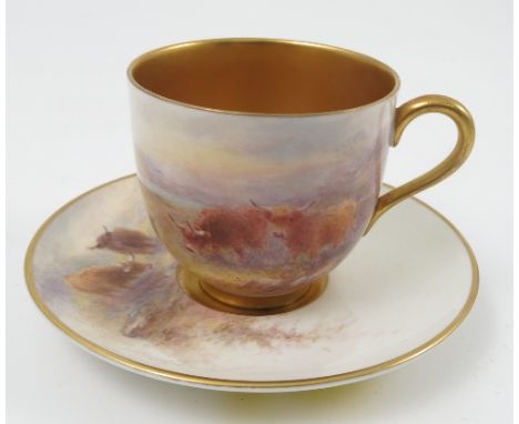 A Royal Worcester cabinet cup and saucer, the exterior of the cup and the saucer hand painted with two Highland cattle in lan