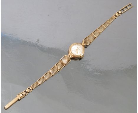 A Rotary ladies 9ct gold bracelet watch, London 1963, to an integral gate link bracelet, weight 10g excluding movement