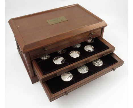 A cased set of sterling silver collectors coins, The Genius of Leonardo Davinci, comprising forty-eight coins (two missing), 