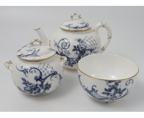 A Royal Worcester tea pot, sugar bowl and covered sugar box, decorated in the 18th century style in blue and white