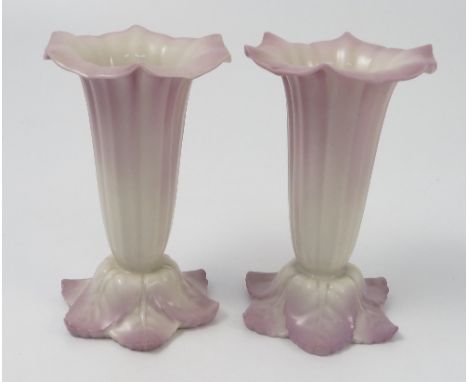 A pair of Royal Worcester spill vases, of flower form, decorated in lilac, shape number G351, dated circa 1917, height 5ins