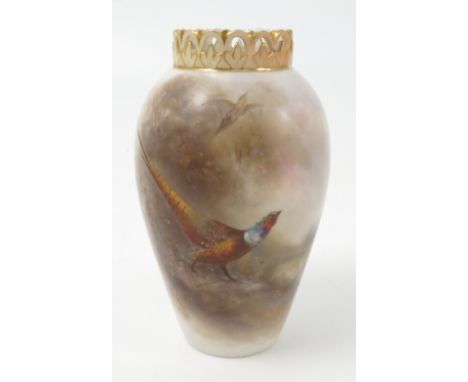 A Royal Worcester vase, decorated with a cock pheasant by James Stinton, with blush ivory pierced neck, shape number G682, da