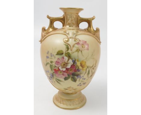 A Royal Worcester blush ivory vase, decorated with flowers, having gilt lugg handles, shape number 1594, dated circa 1892, he