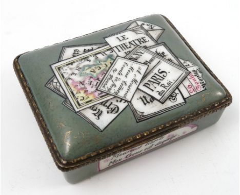 A French porcelain trinket box, of rectangular form, with French script to a green ground, having gilt metal mounts and gold 