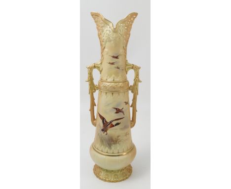 A Grainger's Worcester blush ivory vase, decorated with a flighting duck, with two open handles and pierced neck, shape numbe