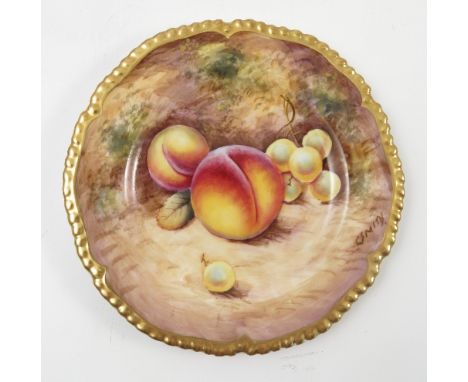 A Royal Worcester side plate, decorated with fruit to a mossy background by C Smith, with shaped gilt edge, diameter 5.75ins