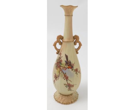 A Locke and Co Worcester blush ivory vase, decorated with a Robin on sprays of flowers, height 9ins