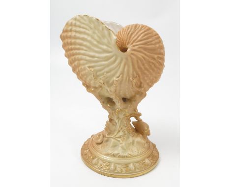 A Royal Worcester blush ivory coral centre piece, with a naturalistically moulded shell, dated circa 1910, height 8ins

