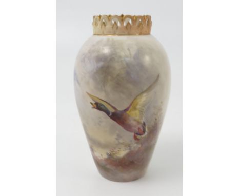 A Royal Worcester vase, decorated with a flighting mallard duck by James Stinton, shape number G682, dated circa 1909, restor