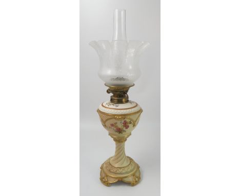 A Royal Worcester associated oil lamp, having a gilt ivory reserve and associated blush ivory column, all decorated with flow