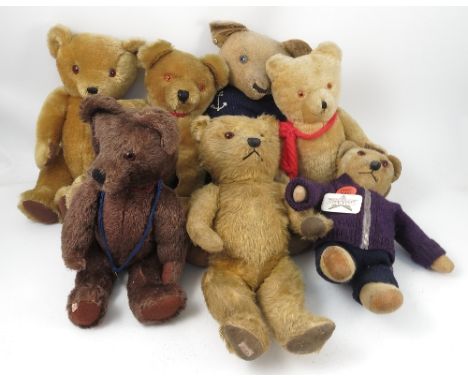A group of 20th century gold plush teddy bears, all with growlers, to include Chiltern, Gwentoys, etc