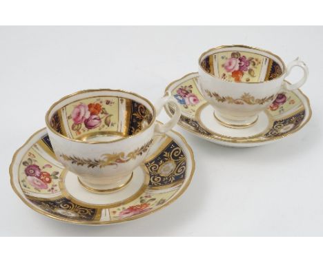 A 19th century English porcelain part tea service, the interior of the cups, saucers and plates decorated with flowers to a y