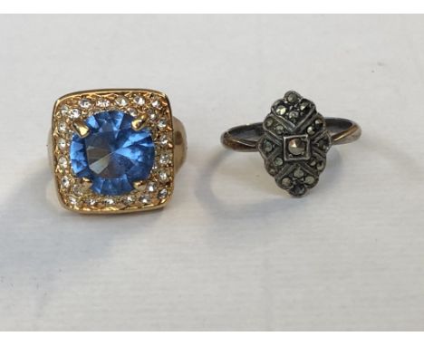 SILVER MARCASITE MARQUISE RING SIZE R AND A ROSE METAL COLOURED BLUE GLASS AND DIAMANTE DRESS RING SIZE O