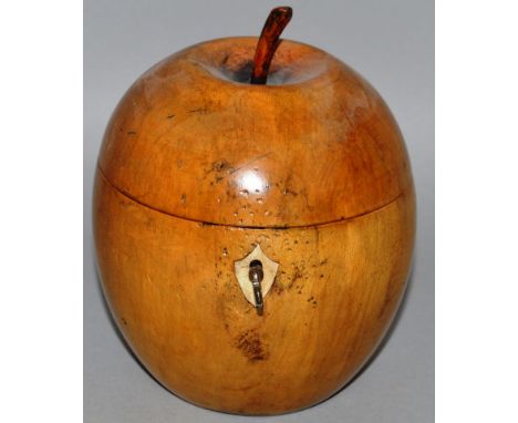 AN APPLE FRUITWOOD TEA CADDY with mother of pearl escutcheon and tin lined interior. 5.5ins high. 