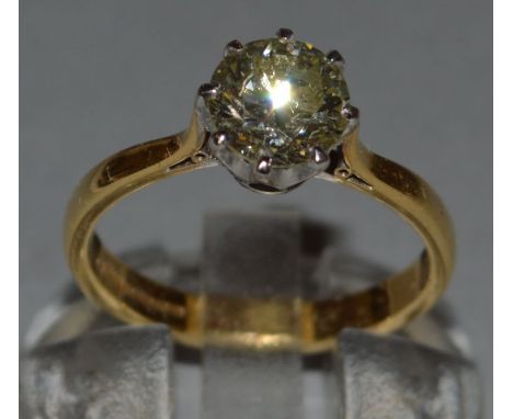 A GOOD SOLITAIRE DIAMOND RING, round brilliant cut, approx. 1.25cts, natural fancy light yellow set in 18ct yellow gold. Sold