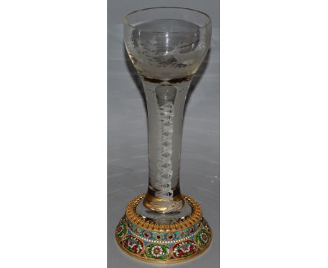 A SUPERB RUSSIAN SILVER AND ENAMEL GLASS GOBLET, the bowl engraved with deer in a landscape. 12ins high. 