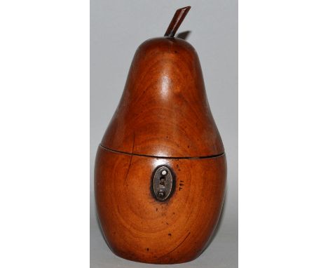 A PEAR FRUITWOOD TEA CADDY with metal escutcheon. 7ins high. 