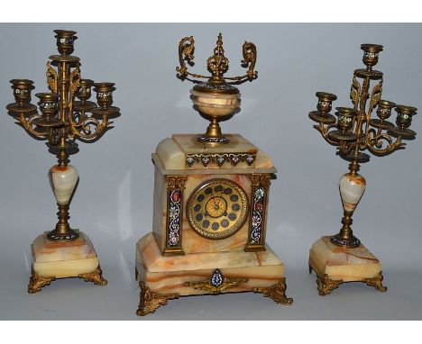 A GOOD 19TH CENTURY FRENCH ONYX AND CHAMPLEVE ENAMEL THREE PIECE CLOCK GARNITURE, the clock with eight day movement striking 