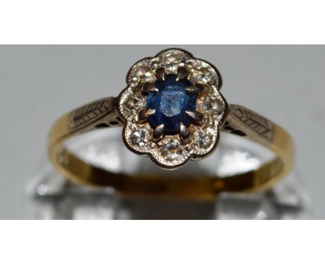A SAPPHIRE AND DIAMOND OVAL RING. 