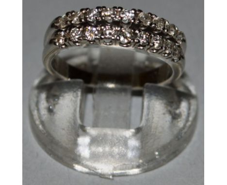 A DOUBLE ROW DIAMOND RING set in 18ct white gold. 