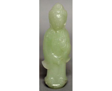 A CHINESE CELADON JADE-LIKE FIGURE OF GUANYIN, 3.3in high. 