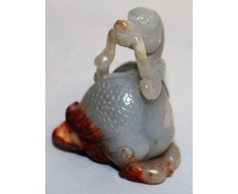 A CHINESE JADE MYTHICAL BIRD CARVING, 2.4in high. 