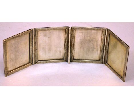 A STERLING .925 ENGINE TURNED FOLDING PHOTO FRAME. 