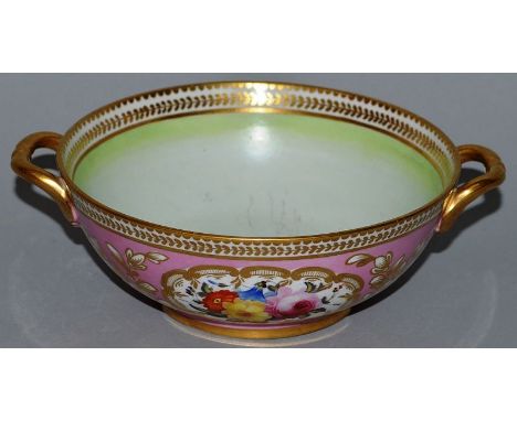 A SUPERB, POSSIBLY SPODE, TWO HANDLED CIRCULAR BOWL edge in gilt and panted with panels of flowers. 6ins diameter. 