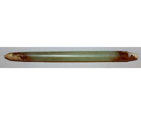 A CHINESE CELADON GREEN JADE-LIKE HAIR PIN ORNAMENT, it’s ends with brown and white inclusions, 3.75in long. 
