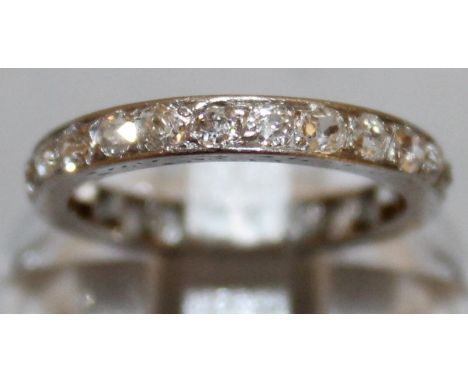 A DIAMOND SET ETERNITY RING in a leather box ASPREY & BIRCH & GAYDON. 