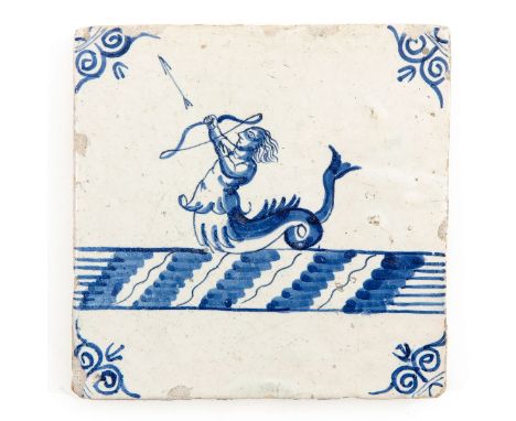 Blue - white decor of an arrow-shooting sea creature, 1st quarter 17th Century, approx. 13 x 13 cm.