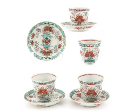 Polychrome floral decor, saucers are 12 cm. in diameter, one cup is restored. 