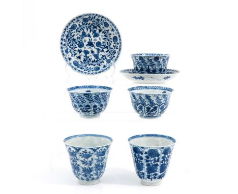 Including 5 cups and 2 saucers, blue and white floral decors, saucers are 13 cm. in diameter. 