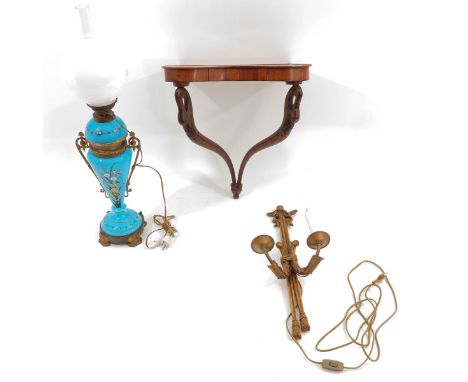 Including an opaline lamp, 2 wall lamps, and a wall console 48 x 50 x 26 cm.