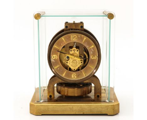 Jaeger-LeCoultre, model Atmos, height 23 cm., 1 glass plate missing.