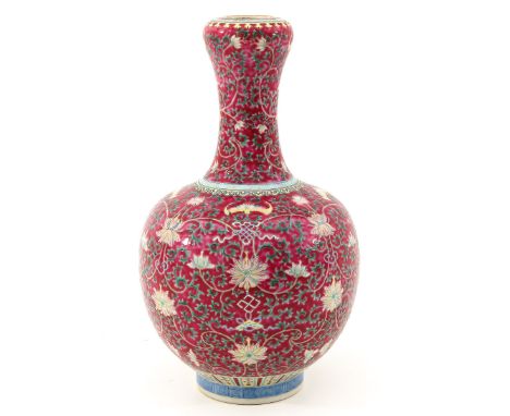 Ruby ground decorated with flowers and bats, Qianlong mark, 30 cm. tall. 