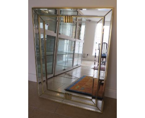 A modern gilt cushion mirror - 112cm x 85cm - in good condition 