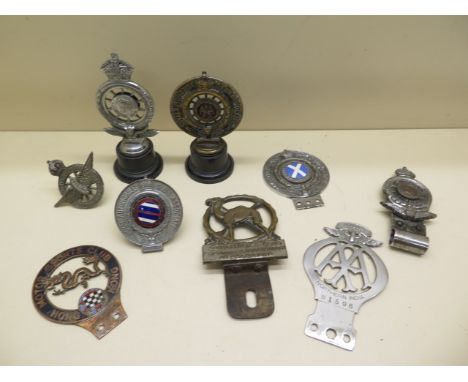 A collection of eight Royal Automobile Club Associate and other motoring car badges including AA Northern India and Touring A