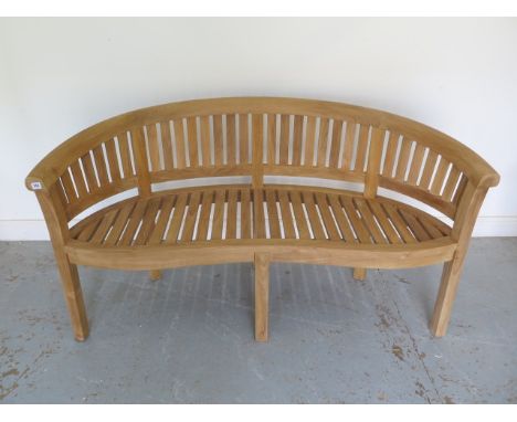 A brand new premium teak banana bench - Width 160cm x Height 84cm x Depth 57cm 