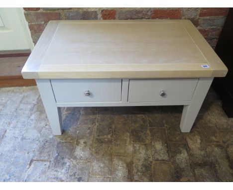 A painted two drawer coffee table with light oak top - Height 50cm x 90cm x 55cm 