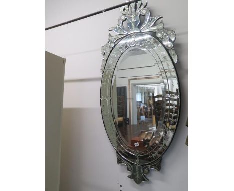 A Venetian style ornate mirror - 144cm x 64cm 